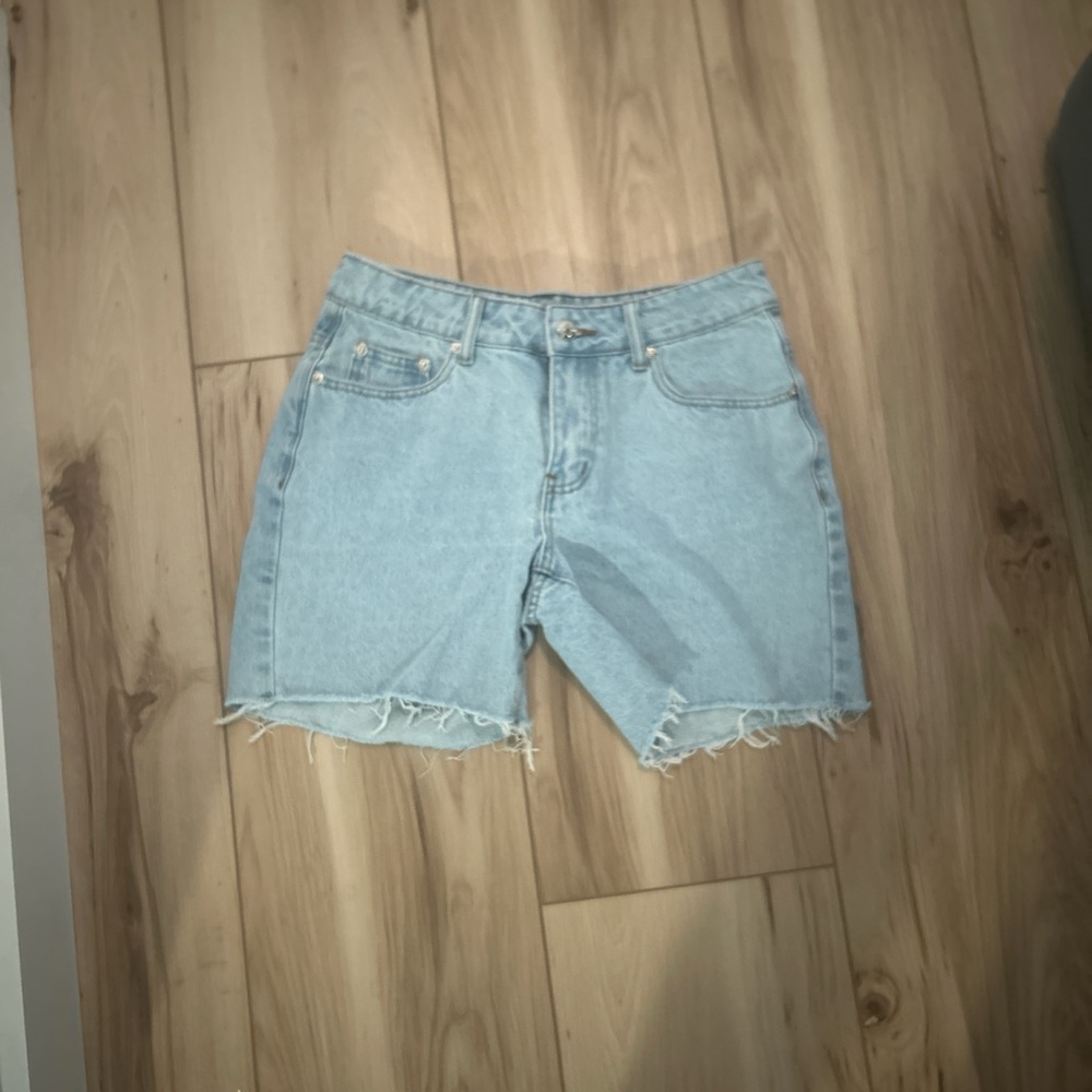 Edikted light blue denim cut off shorts